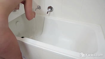 Pierced blonde beauty from Yanks Kim Cums masturbating and cumming in the bath tub